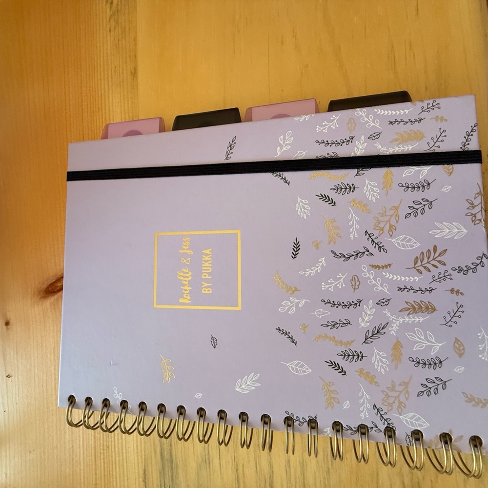 Source Unknown Purple and Gold Spiral Notebook